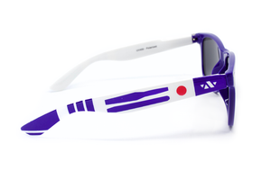 Side view of blue and white sunglasses. Red dot on the temple, close to the front of the frames